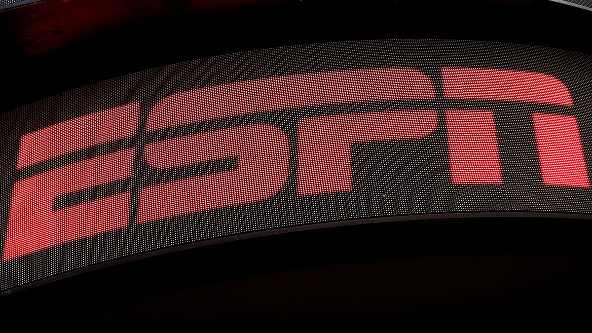 The ESPN logo is seen on an electronic display in Times Square in New York City, U.S., August 23, 2017. REUTERS/Mike Segar - RC110F0E41C0