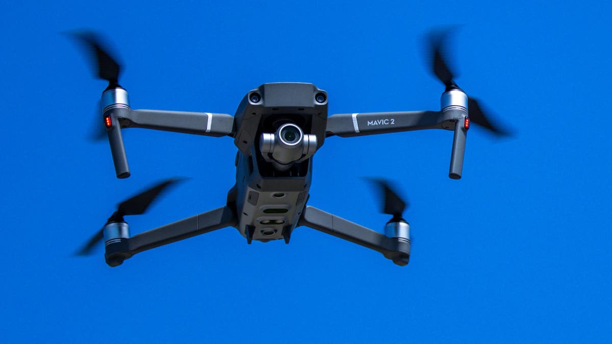A drone flies in the sky