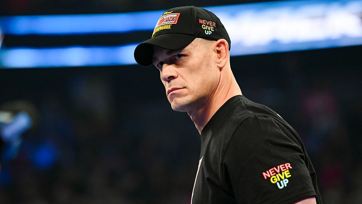 John Cena looks on