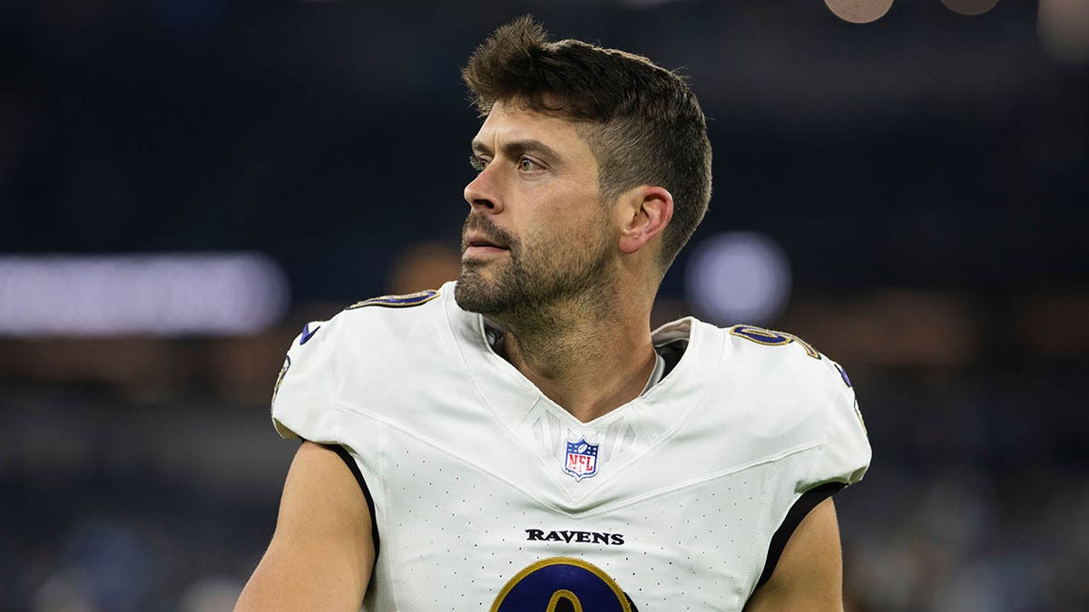 Justin Tucker walks back