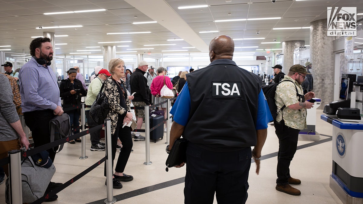 Scenes at the airport as REAL ID requirements go into effect