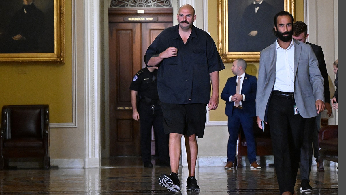 Fetterman walking in Capitol