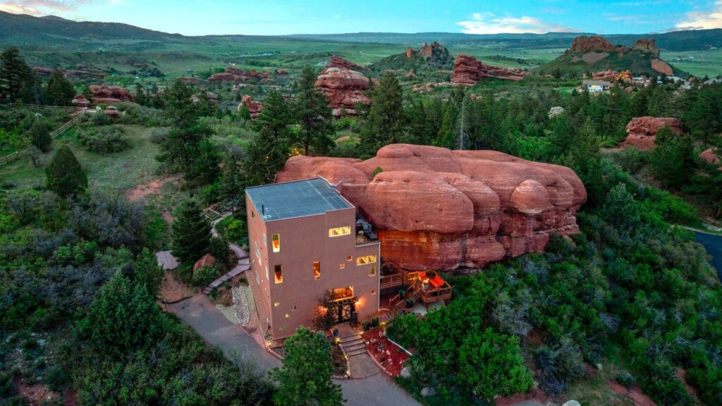 This M ‘Flintstones’-style home built into ancient red rock could be yours
