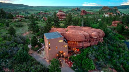 This M ‘Flintstones’-style home built into ancient red rock could be yours
