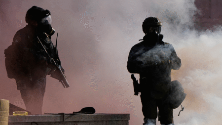 Officers injured as Portland rioters breach ICE building with explosives and rocks