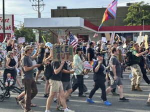 Innocent bystander gunned down at Utah protest as peacekeepers take aim at armed suspect