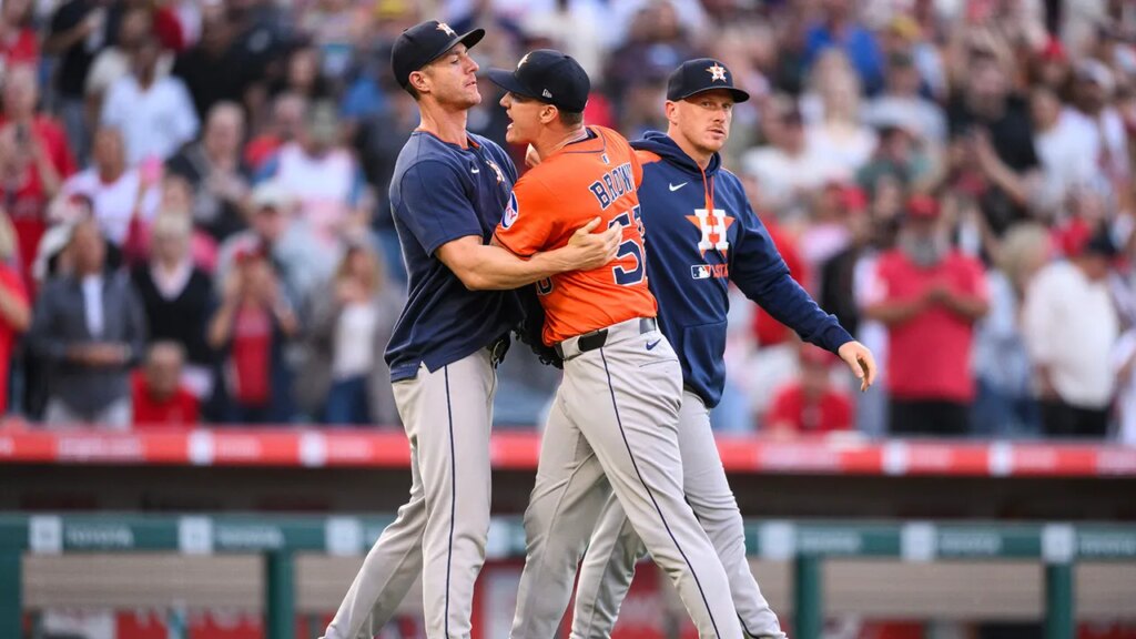 Astros pitcher confronts Angels shortstop after hitting him with pitch, sparking bench-clearing scene