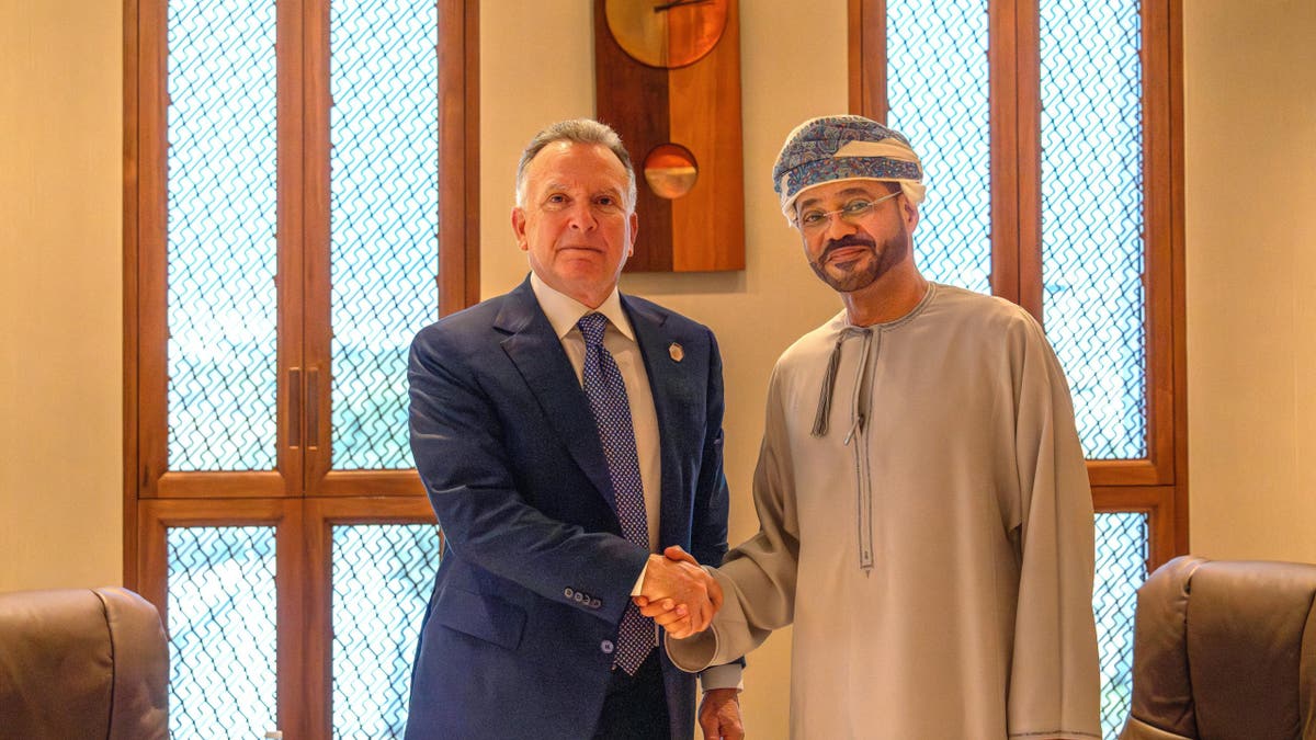 U.S. Special Envoy to the Middle East Steve Witkoff, left, shakes hands with Omani Foreign Minister Sayyid Badr Albusaidi in Muscat, Oman, on April 12, 2025.