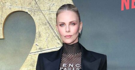 Charlize Theron Says She’s on Raya But She’s Not Impressed: ‘Every Guy Has a Burning Man Picture’