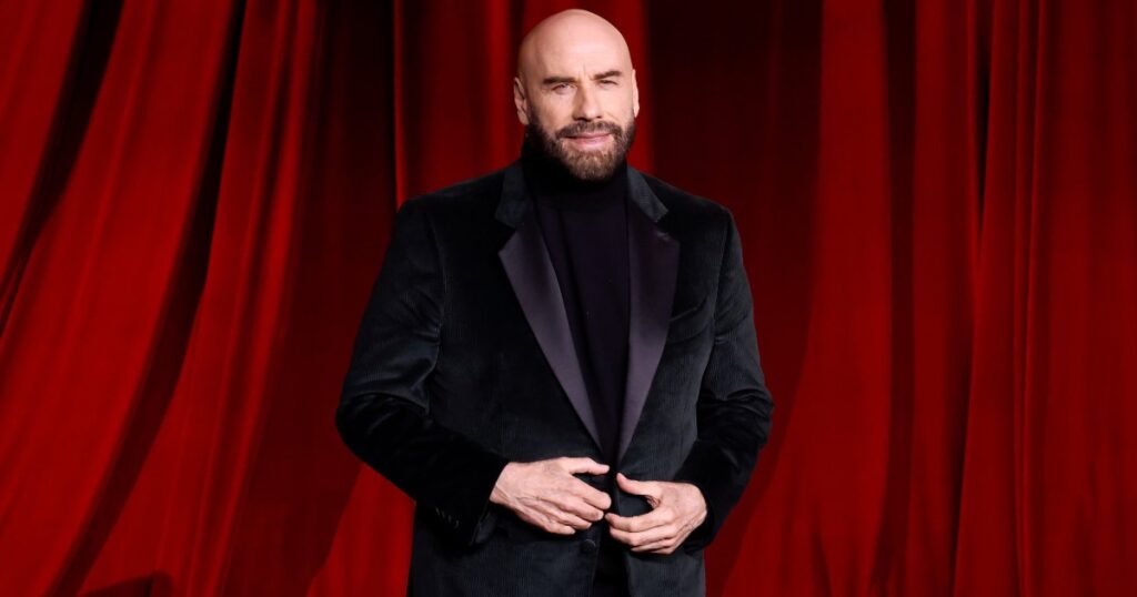 John Travolta Makes Surprise Appearance at ‘Grease’ Sing-A-Long Wearing Danny Zuko-Style Wig