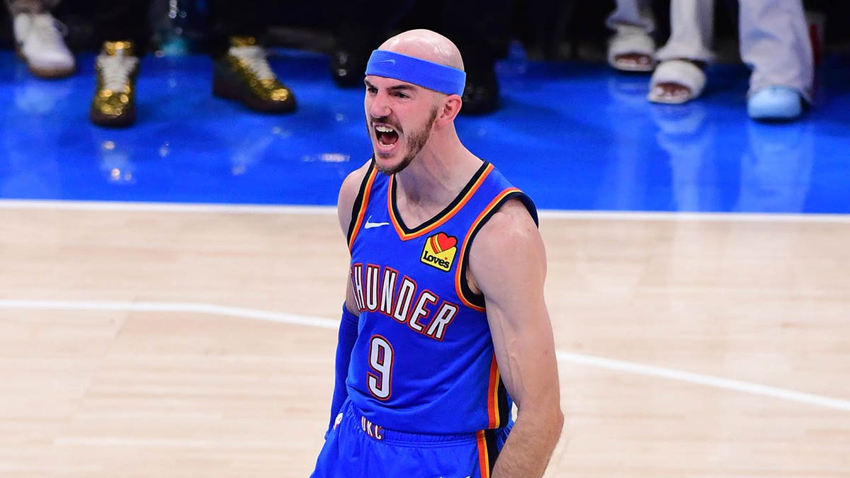 Alex Caruso reacts on court