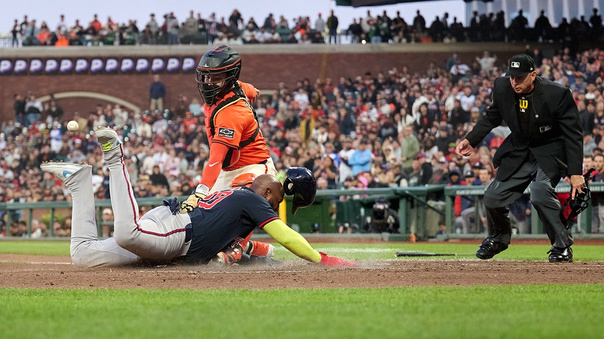 Marcell Ozuna Jr slides
