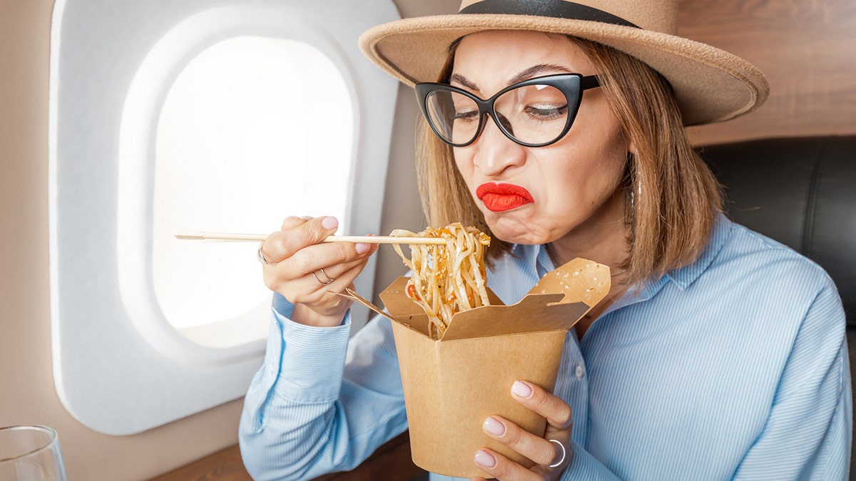 flight passenger eating