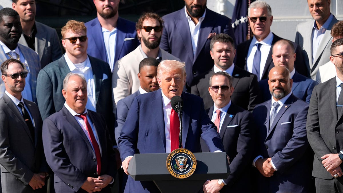 Donald Trump with Eagles in background