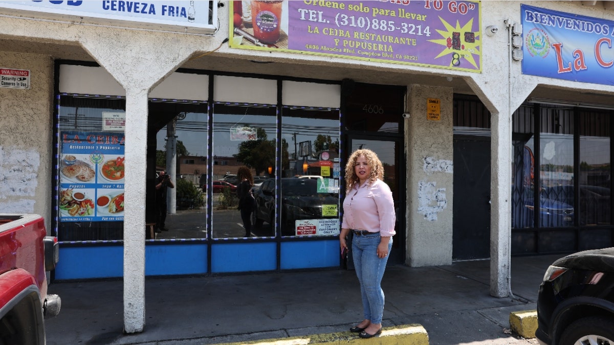 Elizabeth Mendoza, owner of La Ceiba, stands outside her restaurant in Long Beach, California