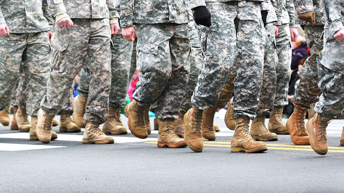 Soldiers dressed in army camouflage in an army parade