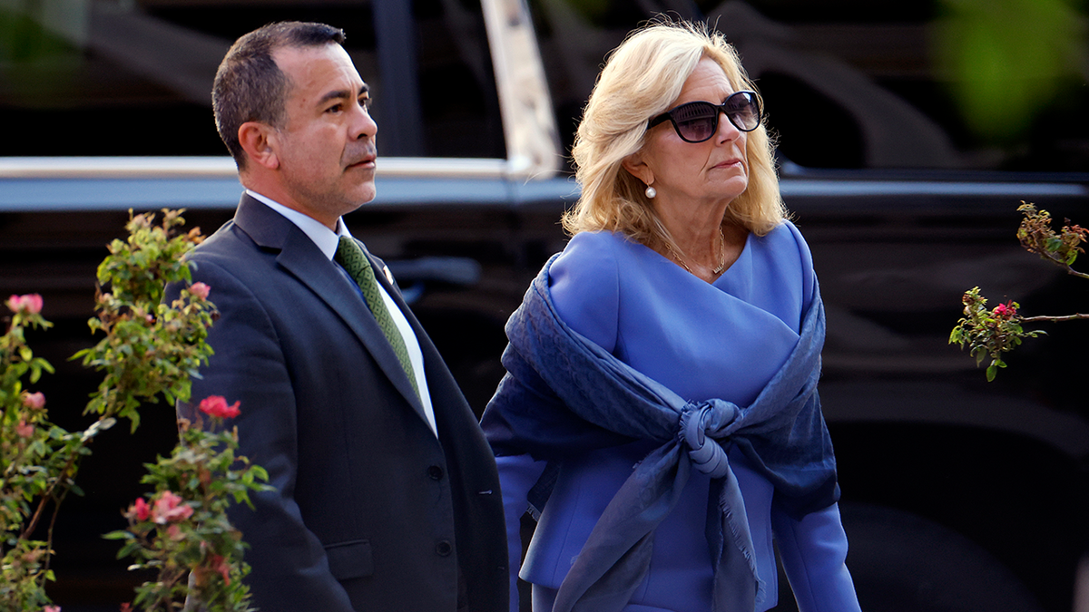 First lady Jill Biden and her senior advisor Anthony Bernal arrive at the J. Caleb Boggs Federal Building on June 7, 2024, in Wilmington, Delaware.