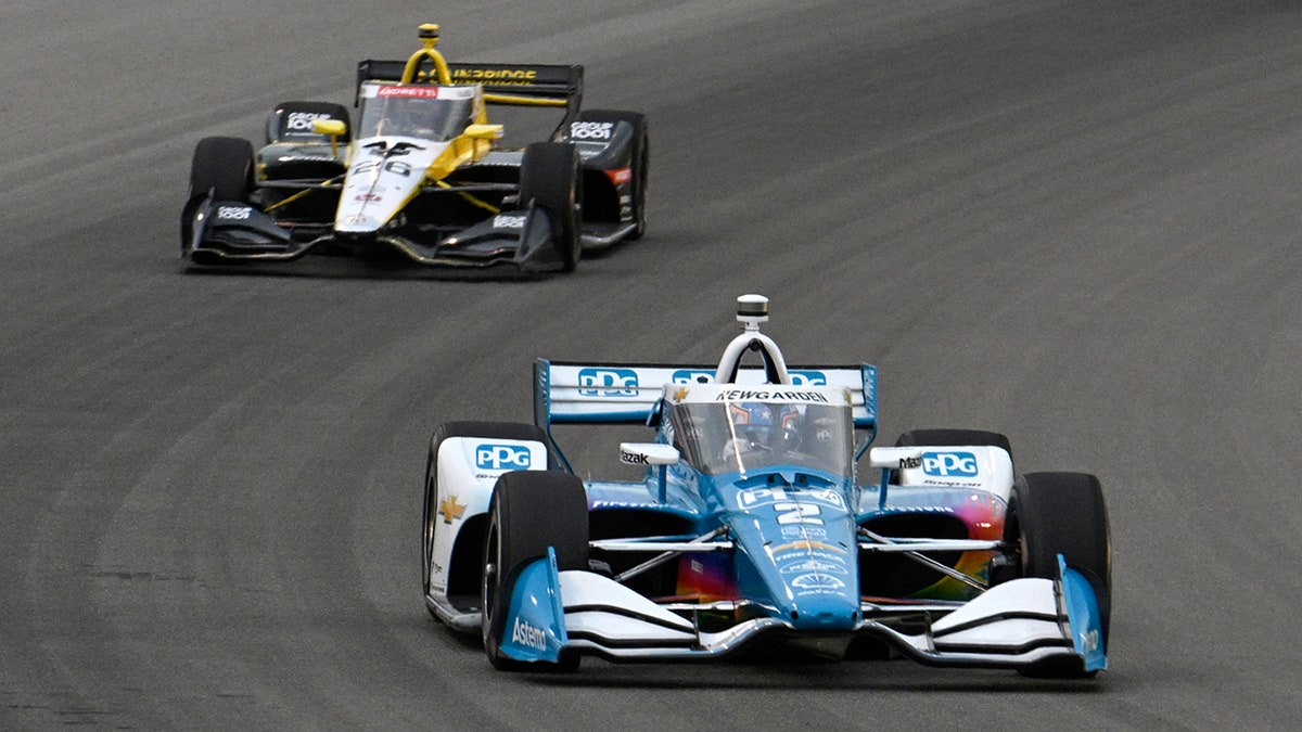 Josef Newgarden fights for position