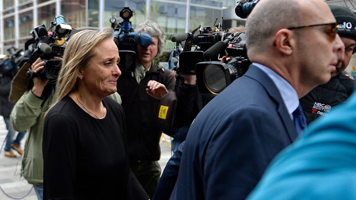 Judge Joseph and attorney walk out of Boston federal court in 2019