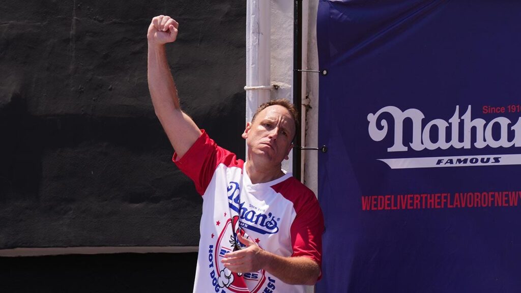 Joey Chestnut reclaims Hot Dog Eating Contest title after last year’s absence by downing 70.5 franks