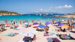 Summer beach battle between locals and visitors heats up as overtourism soars