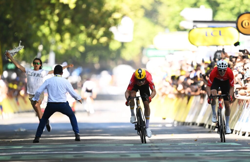 Security guard’s ‘swift move’ stops determined anti-Israel agitator at Tour de France finish