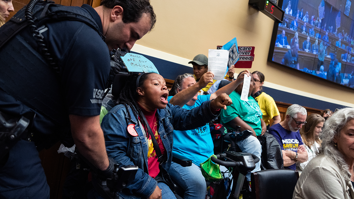 Demonstrators calling for the preservation of Medicaid funding