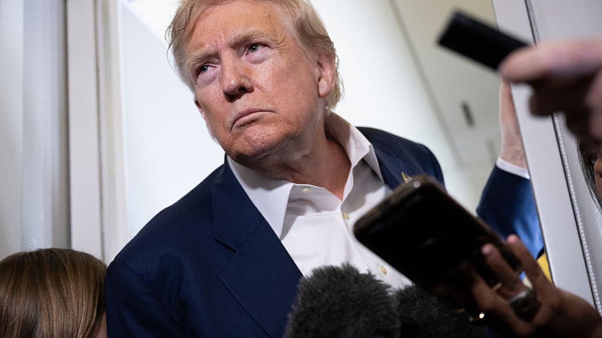 trump with reporters