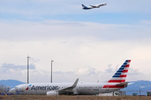 American Airlines flight engulfed in ‘a lot of smoke, fire,’ causing panicked passengers to flee via emergency slide, harrowing video shows
