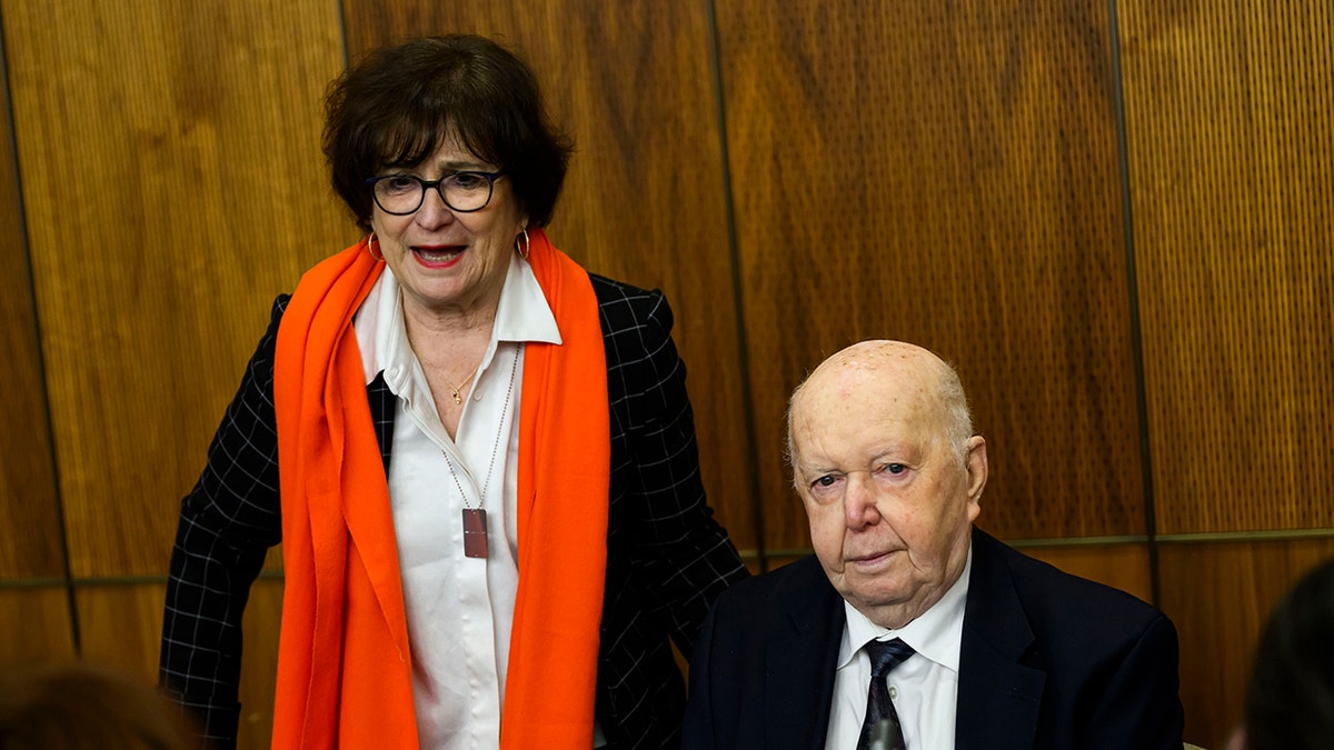 Deborah Lyons, left, the former Special Envoy on Preserving Holocaust Remembrance and Combatting Antisemitism, speaks with David Moscovic, a Holocaust and Auschwitz survivor, before an event commemorating the 80th anniversary of the Liberation of Auschwitz, in the Parliamentary Precinct in Ottawa, on Friday, Jan. 24, 2025. 