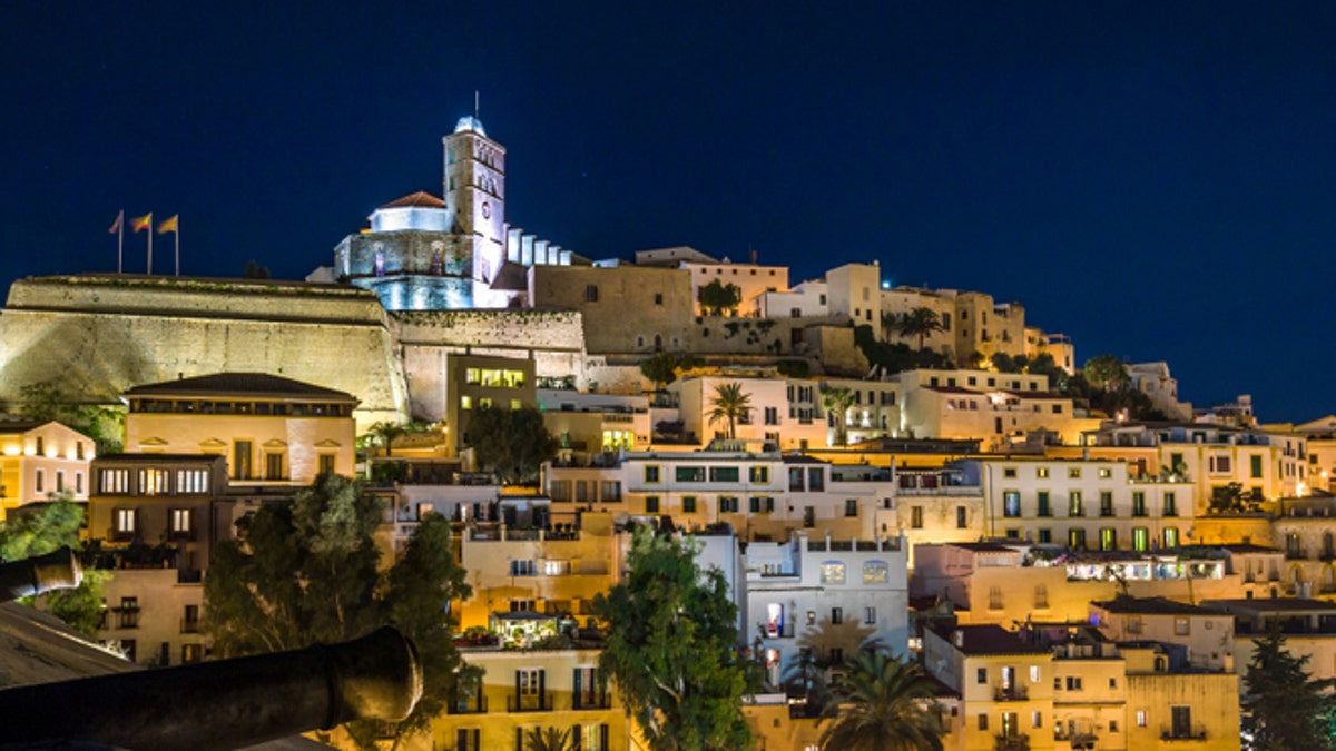 Old town Ibiza on the hill. Houses, fortress and cathedral night scene. Eivissa island, Spain.