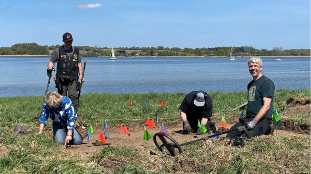 Metal detectorists working near Schlei river