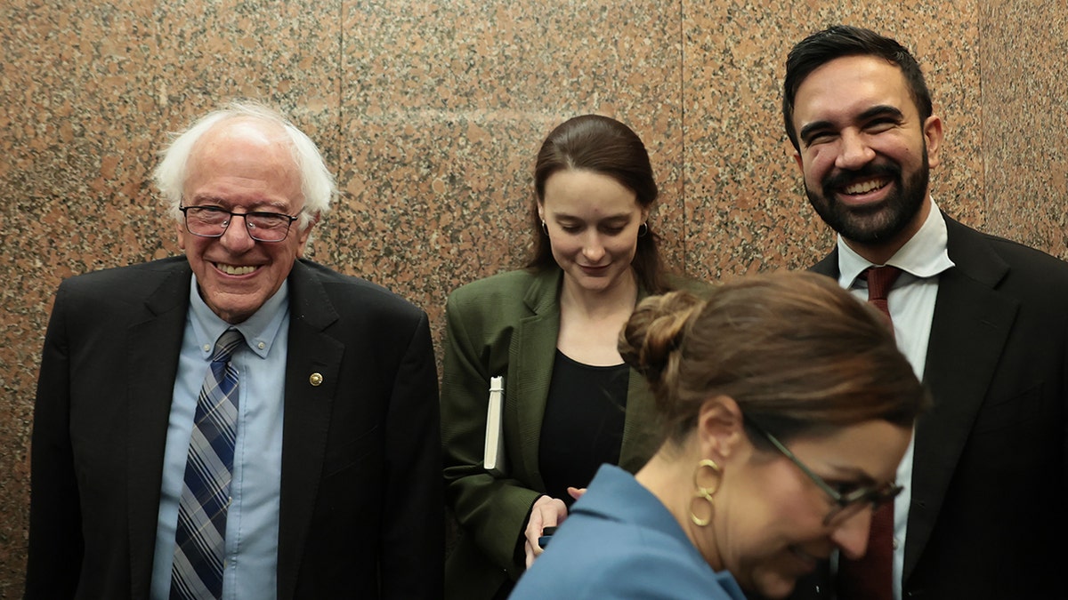 Bernie Sanders and Zohran Mamdani smile in elevator
