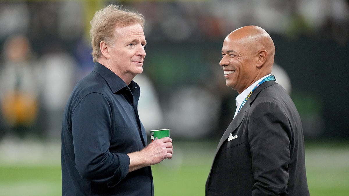 Roger Goodell and Lloyd Howell talk