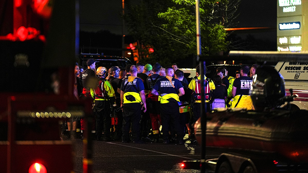 Emergency response team gathered in the street