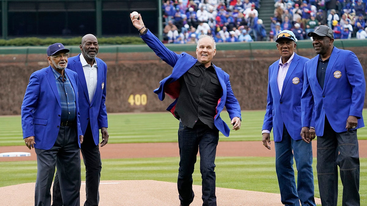 Ryne Sandberg throws pitch