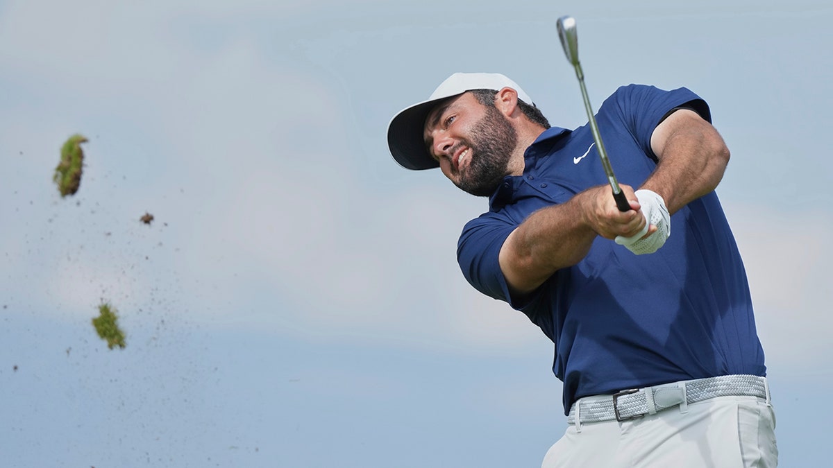 Scottie Scheffler swings