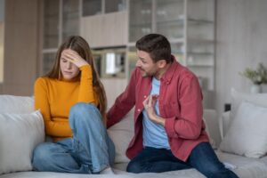 Dear Abby: I overheard my brother fighting with his wife — should I say something?