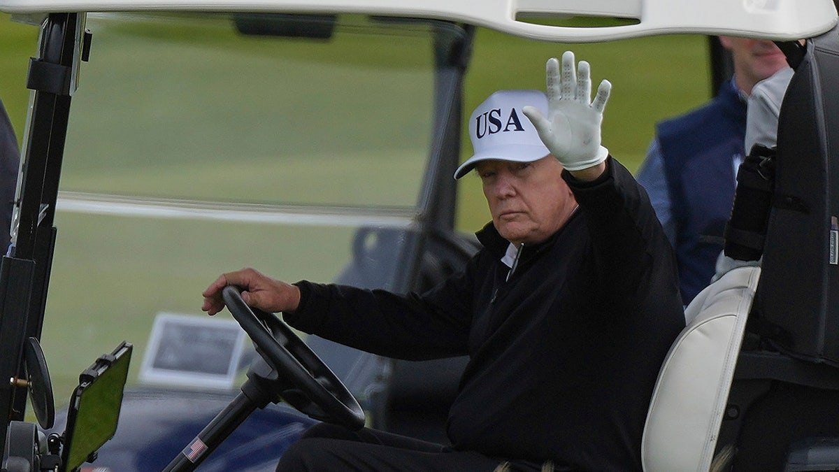 Trump waving