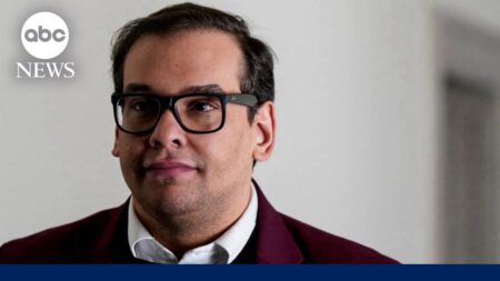 George Santos turns himself into federal prison