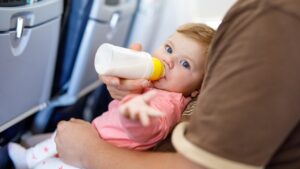 New dad sparks debate for wanting solo vacation with baby, leaving mom behind