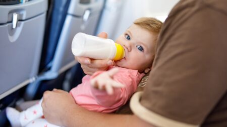 New dad sparks debate for wanting solo vacation with baby, leaving mom behind