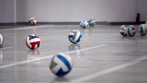 Trans athlete sues university and college sports org after losing women’s volleyball scholarship