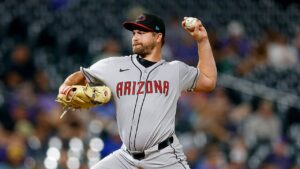 Diamondbacks reliever seals victory over Rockies after swallowing fly mid pitch: ‘I gagged a little’