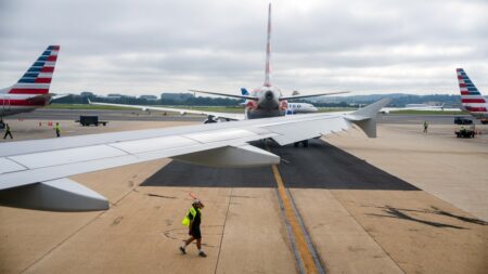 Smoke from unknown passenger device forces emergency landing of American Airlines flight to Washington-Dulles