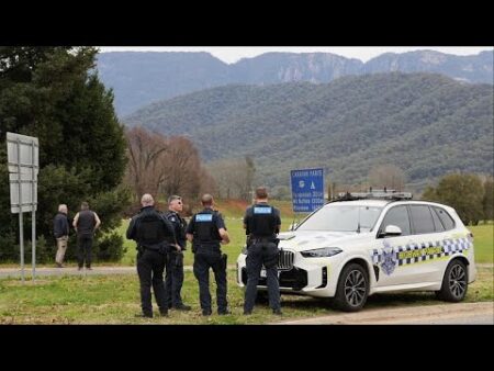 Manhunt for gunman in fatal shooting of two Australian police officers continues