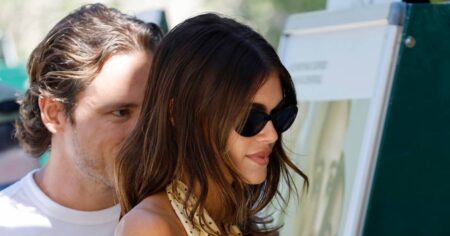 Kaia Gerber Wows in Plunging Butter-Yellow Halter Top During Venice Date With Lewis Pullman