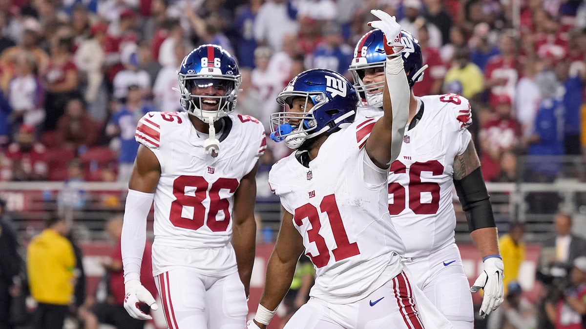 Matt Breida celebrates touchdown