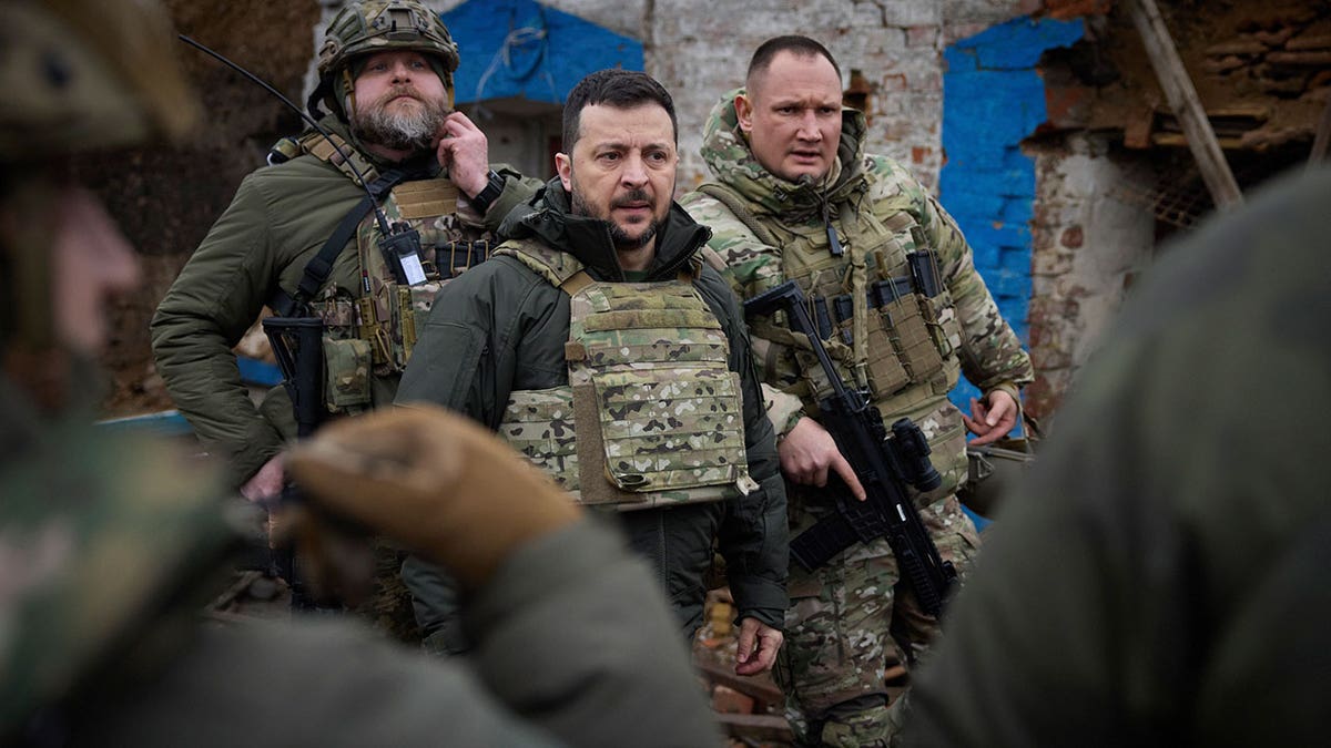 Volodymyr Zelenskyy with troops