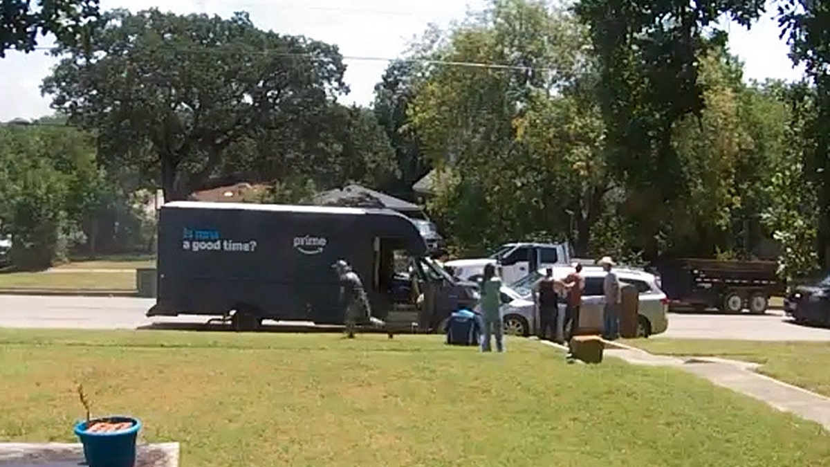 Witnesses and passerbys tend to the scene of the crash, help individuals involved